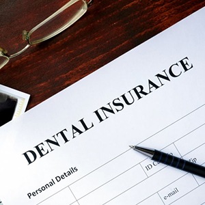 Dental insurance form sitting on a desk